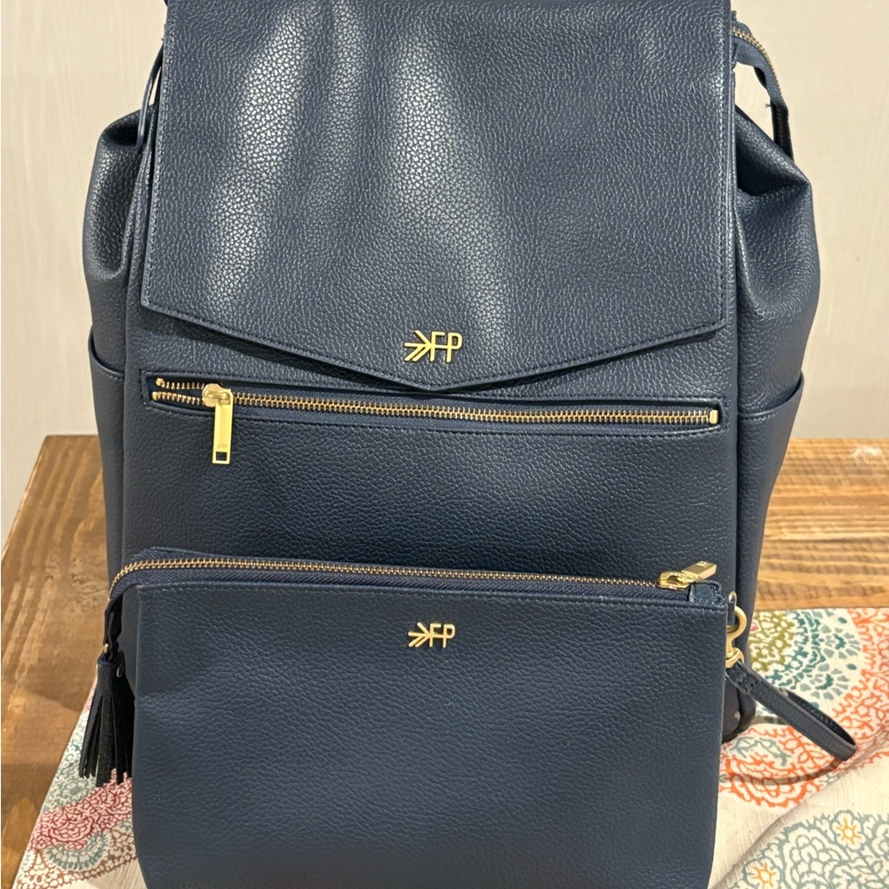 Navy Blue Backpack with Gold Accents
